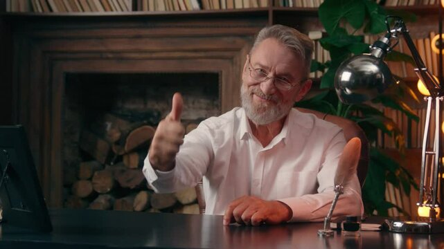 Caucasian mature old man male businessman business showing thumbs up smile approval agreement entrepreneur office home gesture sign good work success boss recommend senior manager ceo satisfied inside