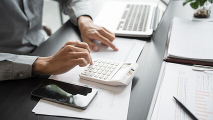 Business man accountant financial analyst and auditor working and laptop for calculating 