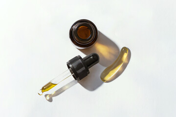 Essential Oil  Dropper Bottle with dropper and oil on side