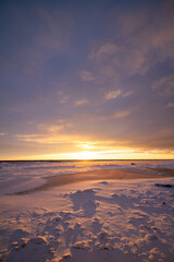 Stunning Winter Sunset Over Snowy Arctic Landscape