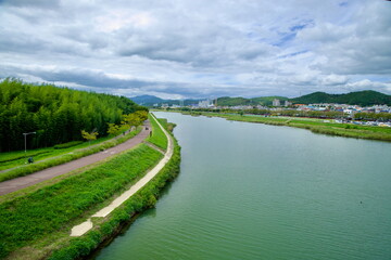 Fototapeta premium View of Taehwagang River and Pathway Looking Upriver