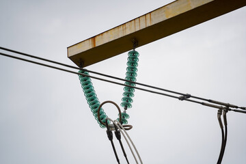 Obraz premium high voltage pole. detail. daytime photo.