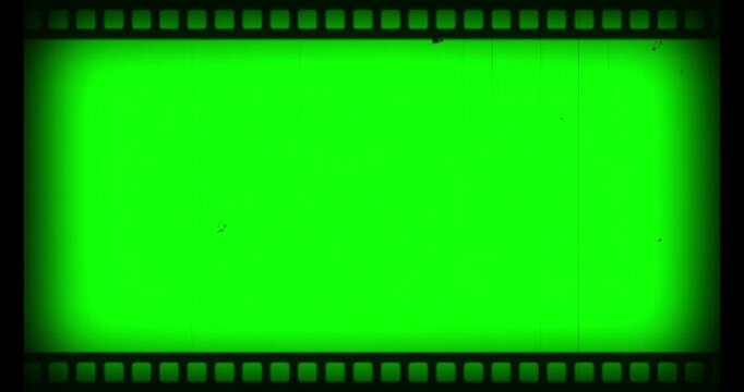 Vintage Film Reel Rolling Horizontally with Classic Look - Green Screen