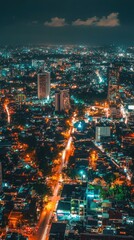 Fototapeta premium Aerial View of City with Skyscrapers at Night