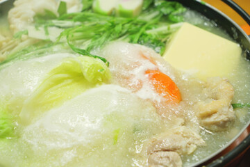 Mizore Nabe, a traditional Japanese home-style nabe dish consisting of grated radish, carrots and...