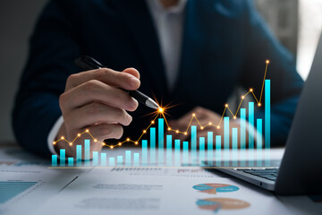 Finance and return on investment, businessman analyzing data chart, investment in assets Business...
