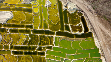 Aerial view of opencast surface sand mining, area with subterranean waters