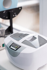 Modern dental clinic equipment displayed in a bright and clean office setting during the day