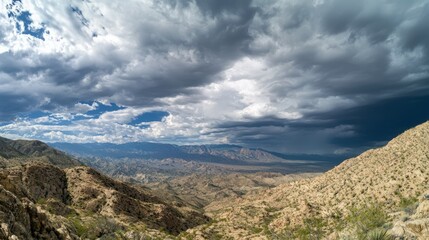 Fototapeta premium Majestic Mountain Range Under Dramatic Sky with Impending Storm, Ultra-Detailed Panoramic Landscape Photography