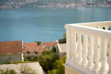 Balcony with sea and distant mountains