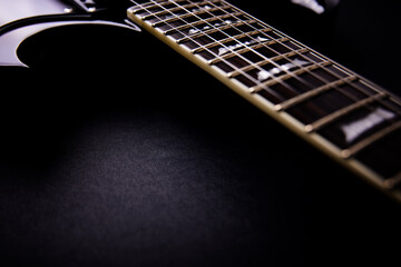 Fretboard of modern electric guitar. Close up.	