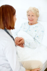 Fototapeta premium Healthcare, senior woman and doctor with holding hands for support, compassion and consultation in bed. Hospital, elderly patient or caregiver with oxygen tube for pneumonia, asthma or expert empathy