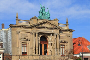 Obraz premium Haarlem Teylers Museum Building Facade with Roof Statue, Netherlands