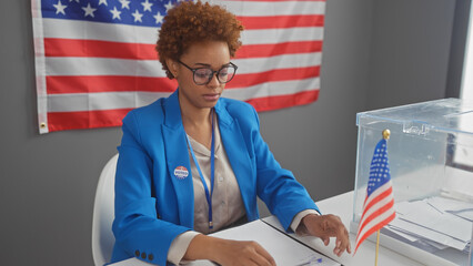 African american woman in a blue jacket scrutinizing ballots at a us electoral college site with an...