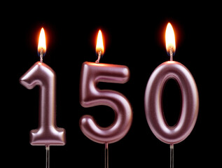 Burning pink birthday candles isolated on black background, number 150