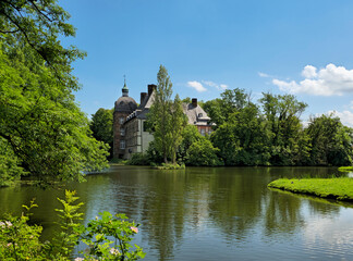 Fototapeta premium Castle Hovestadt, North Rhine-Westphalia, Germany, Europe. Castle Hovestadt is the most typical moated castle in the Muenster region of Germany.