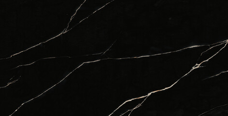 Luxurious black agate marble texture with golden veins, polished marble quartz stone background striped by nature with a unique patterning, it can be used for interior-exterior home decor tile.