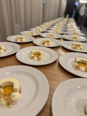 Yellow cake nicely decorated on a white plate.