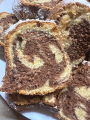 A beautiful kugloff cut into pieces and covered with powdered sugar