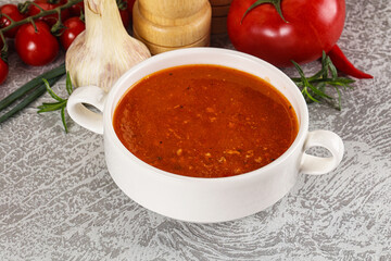 Hot tomato soup with diced chicken
