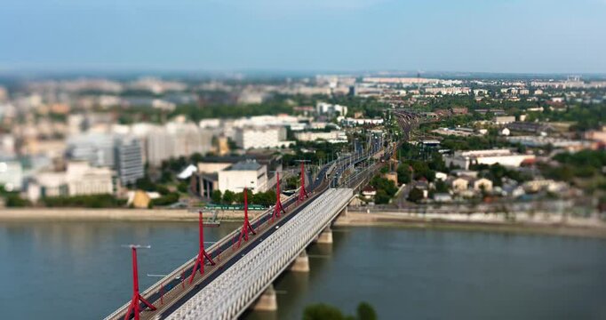 Budapest, Hungary - August 24, 2024: Areal view to Rakoczi Bridge. Timelapse. Focus shifted to the bridge with tilt shifted lens.