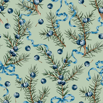 Watercolor seamless pattern with juniper and blue bows on a green background. Elegant winter background for textiles, wrapping paper, wallpaper.