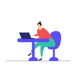 The girl is sitting and working on a laptop