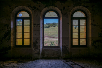 Fototapeta premium Forgotten Building in Northern Italy The Old Abandoned Seminary with a Blue Chapel