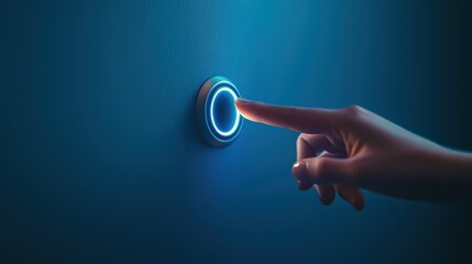 A hand pressing a glowing button on a modern wall, symbolizing interaction with smart technology.