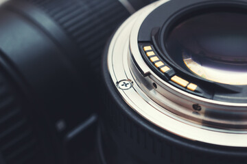 The digital photo camera lens bayonet, closeup view with selective focus