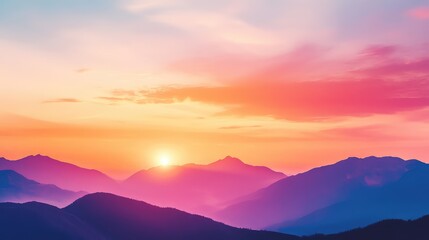 Obraz premium A colorful sunset sky with bold pink, orange, and purple hues glowing above the silhouette of a distant mountain range