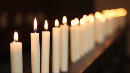 Burning memorial candles in church