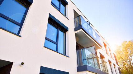 Modern multifamily building in a european city.  Walls made of concrete. Luxury house complex.