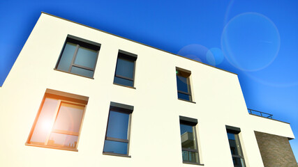 Modern multifamily building in a european city.  Walls made of concrete. Luxury house complex.