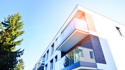 Modern multifamily building in a european city.  Walls made of concrete. Luxury house complex.