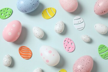 Happy Easter card. Easter eggs on color background, top view