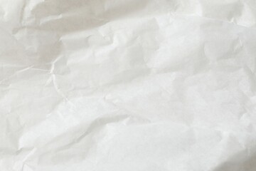 White crumpled paper texture background.