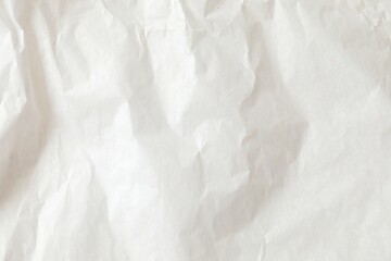 White crumpled paper texture background.