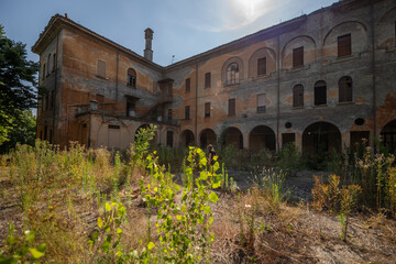 Obraz premium Forgotten Building in Northern Italy The Old Abandoned Seminary with a Blue Chapel