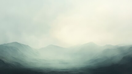 Obraz premium A misty, hazy sky with muted sunlight filtering through the clouds, casting a soft, pale light over the distant mountains