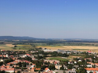 Landscape view with houses, agricultural fields and hills from the castle of S&uuml;meg, Hungary