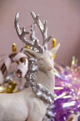 christmas arctic reindeer ornament toy decor with christmas pink glitter background