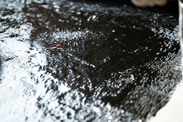 Brushed resin on a concrete surface.