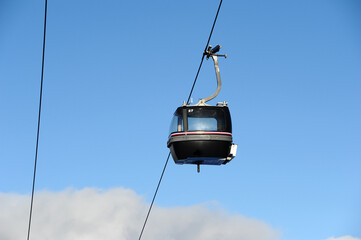 Vintage Ski gondola over the slopes of Courchevel ski resort, French alps