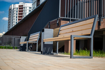 Modern residential area enhancement with benches created for community comfort and outdoor leisure...