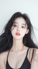 Cool portrait of a young Asian woman in sportswear