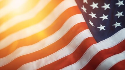 Obraz premium Close-up of Waving American Flag with Warm Light Background