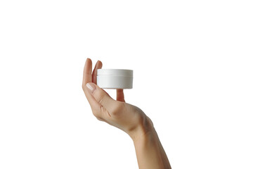 Artistic shot of a hand with a skincare cream jar symbolizing beauty and wellness isolated on transparent background