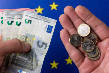 euro banknotes and coins