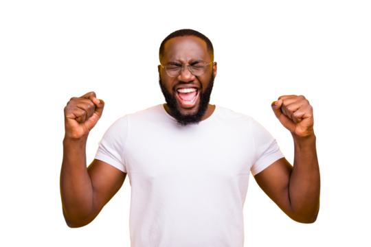 Photo of rejoicing overjoyed joyful black man screaming shouting with his hands showing fists while isolated with vivid background